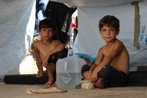On 5 August 2016 in Aleppo city in the Syrian Arab Republic, displaced families take shelter under makeshift tents on Muhalak highway in the western part of Aleppo city, after the latest wave of attacks. As of 2 August 2016 in the Syrian Arab Republic, children in Aleppo city are again facing terrible threats from new intense attacks and fighting in the western parts of the city, while around 120,000 children are among the nearly 300,000 people cut off from life-saving humanitarian aid in the east. In the past few days, violence and fighting escalated with children in the line of fire. UNICEF is calling for immediate access to deliver urgently needed nutritional supplements, medicines, critical health supplies and clean water. On the evening of 2 August 2016, mortar attacks threatened thousands of families in what became the front line neighbourhoods of 1070 and al-Riyadah  a community of 25,000 people already displaced by the Syrian conflict, living in makeshift shelters. Over the past two years, UNICEF has worked intensively with other UN agencies and partners to support these displaced families with water supply, education, psycho-social support and health services. By nights end, virtually all 25,000 people, including around 12,000 children, had fled the bombardments with nothing more than the clothes on their backs.